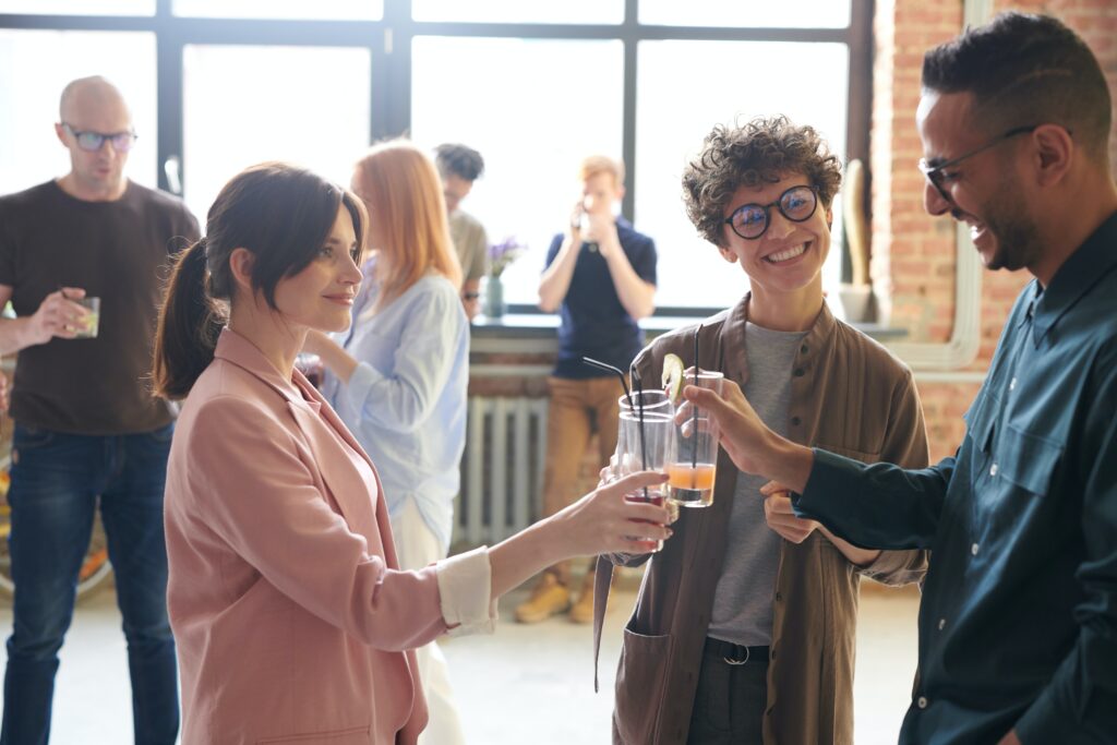 Photo Of People Holding Glasses